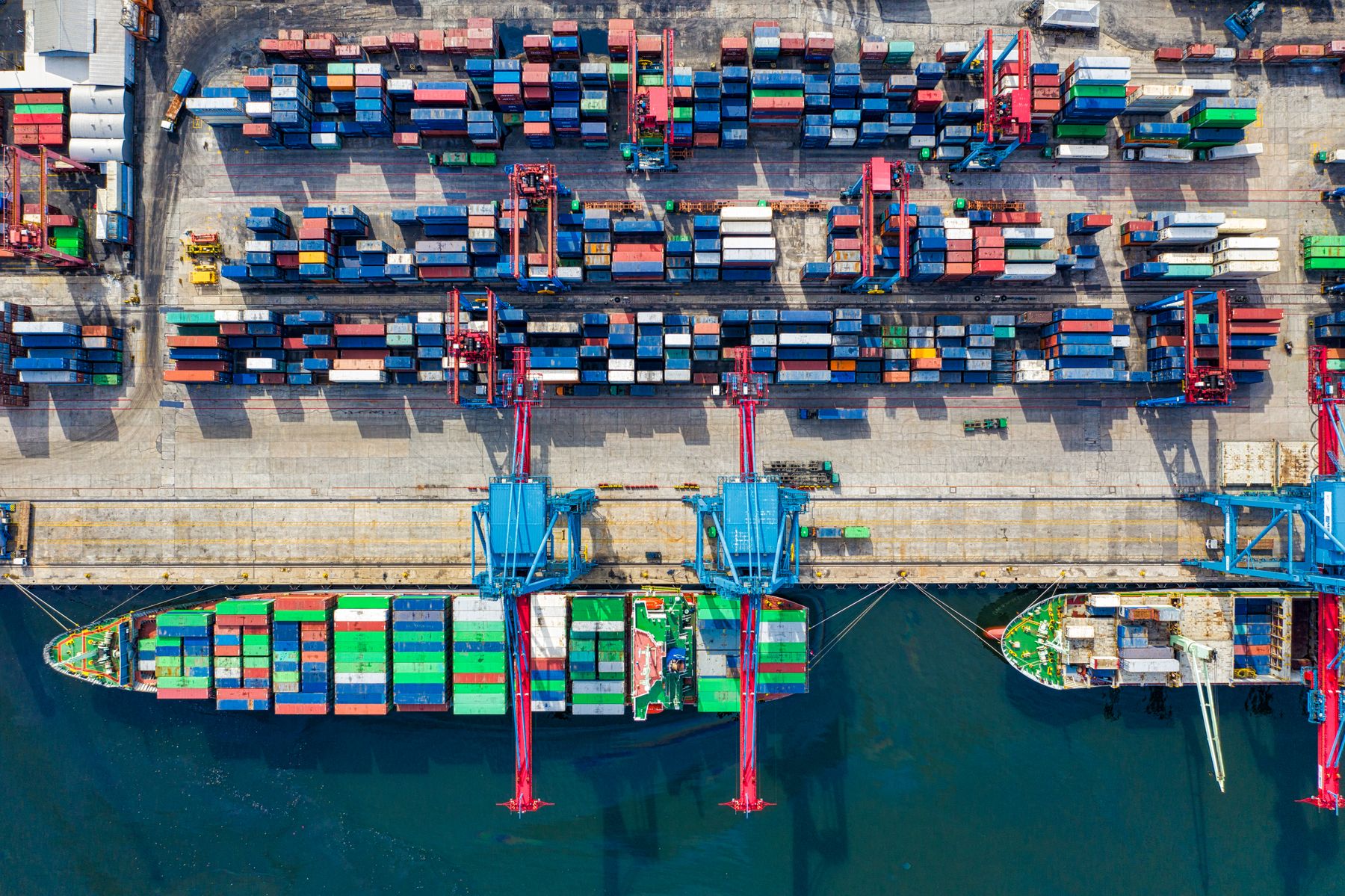 Container ships at a cargo terminal.